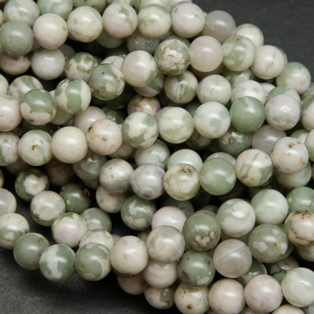 Polished finish round harmony jasper beads for handmade jewelry crafting.