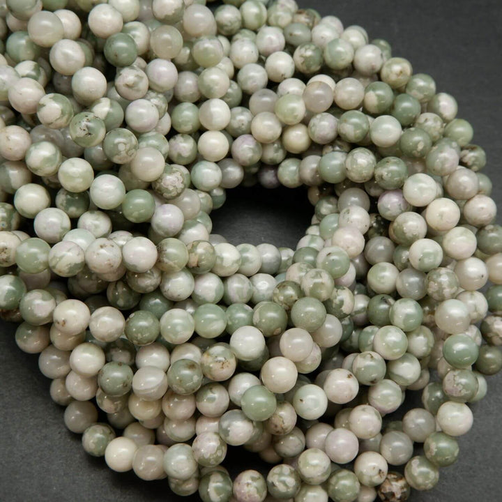 Polished finish round harmony jasper beads for handmade jewelry crafting.