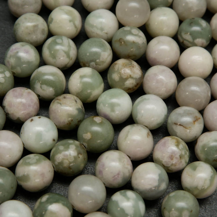 Polished finish round harmony jasper beads for handmade jewelry crafting.