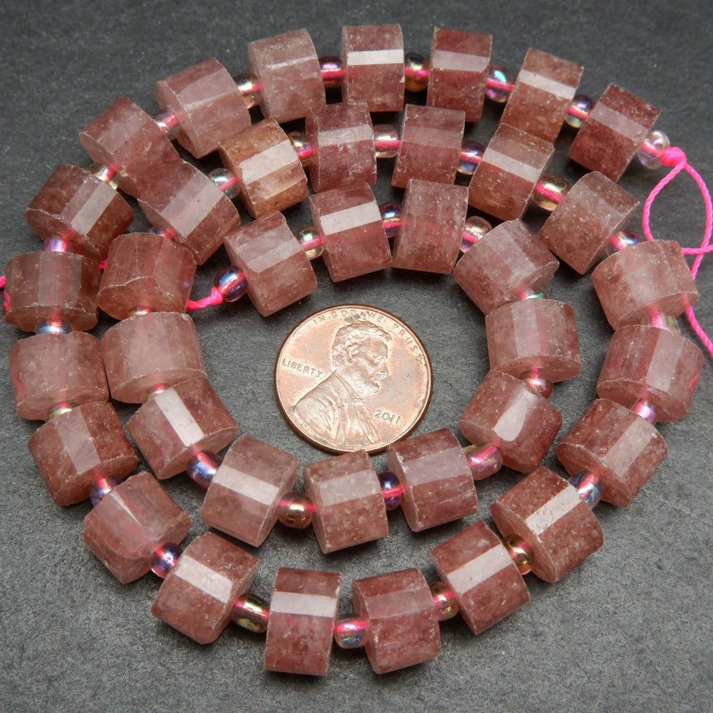 Faceted heishi pink strawberry quartz beads.