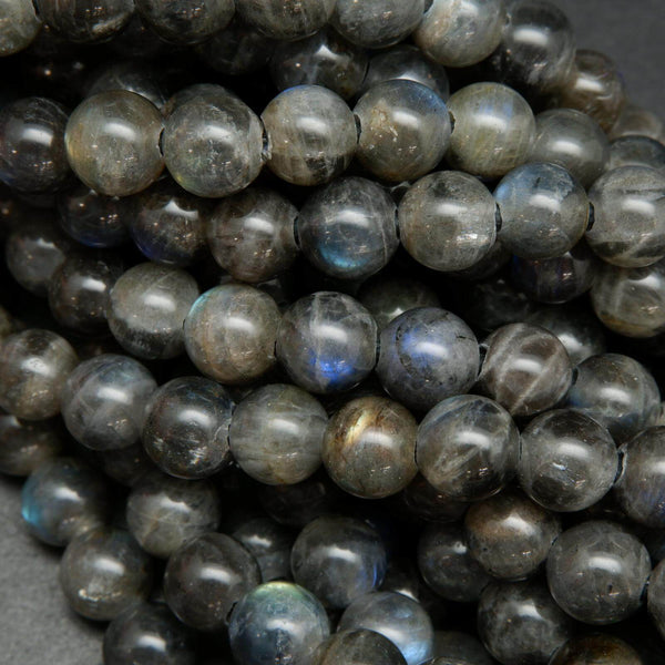 Gray fire labradorite beads with lots of blue flash.