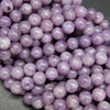 Purple lepidolite loose beads.