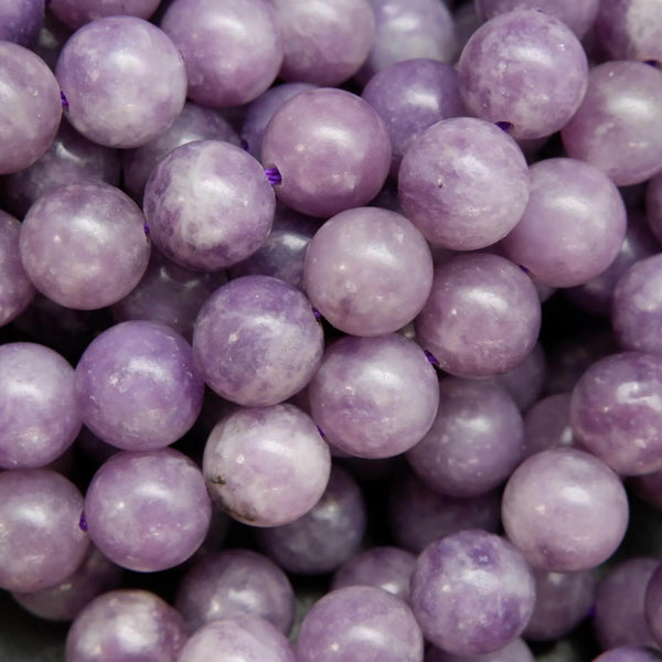 Purple lepidolite loose beads.