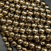 Faceted Light Gold Hematite Beads.