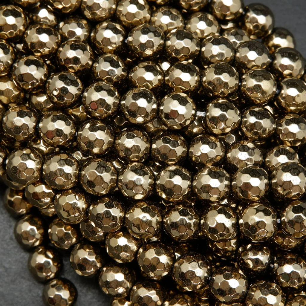 Faceted Light Gold Hematite Beads.
