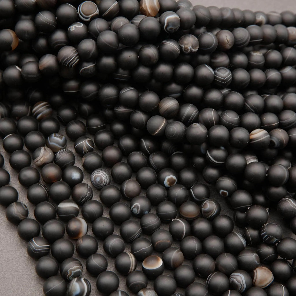 Matte sardonyx agate beads.