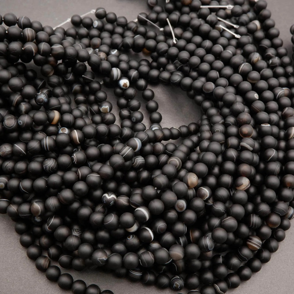 Matte sardonyx agate beads.