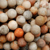 Mixed fossil coral beads for jewelry making.