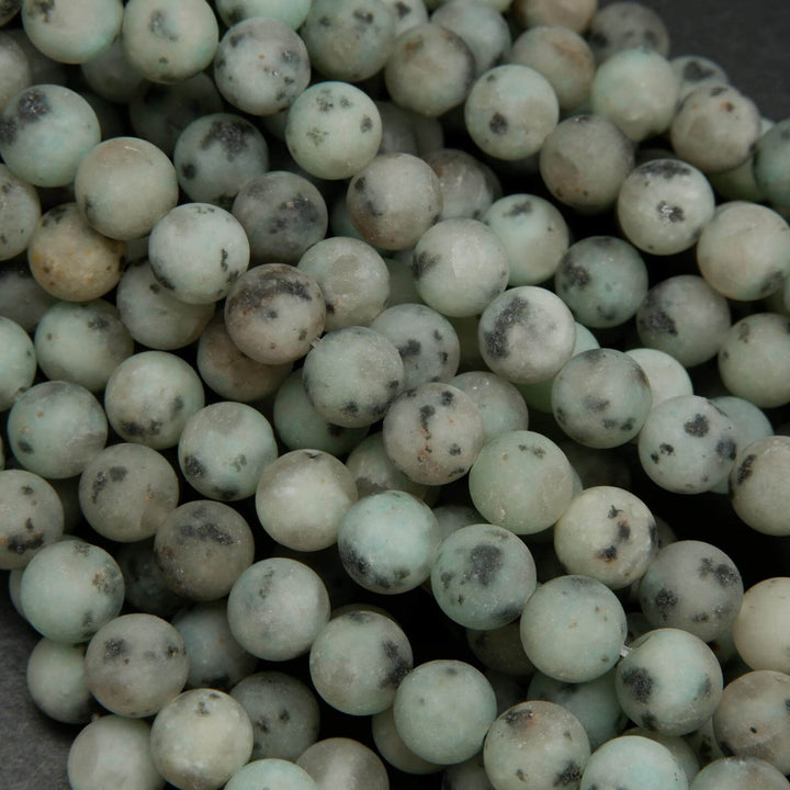 Matte finish mint green kiwi jasper beads.