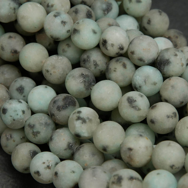 Matte finish mint green kiwi jasper beads.
