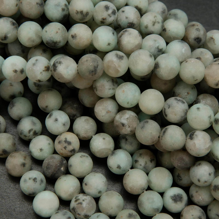 Matte finish mint green kiwi jasper beads.