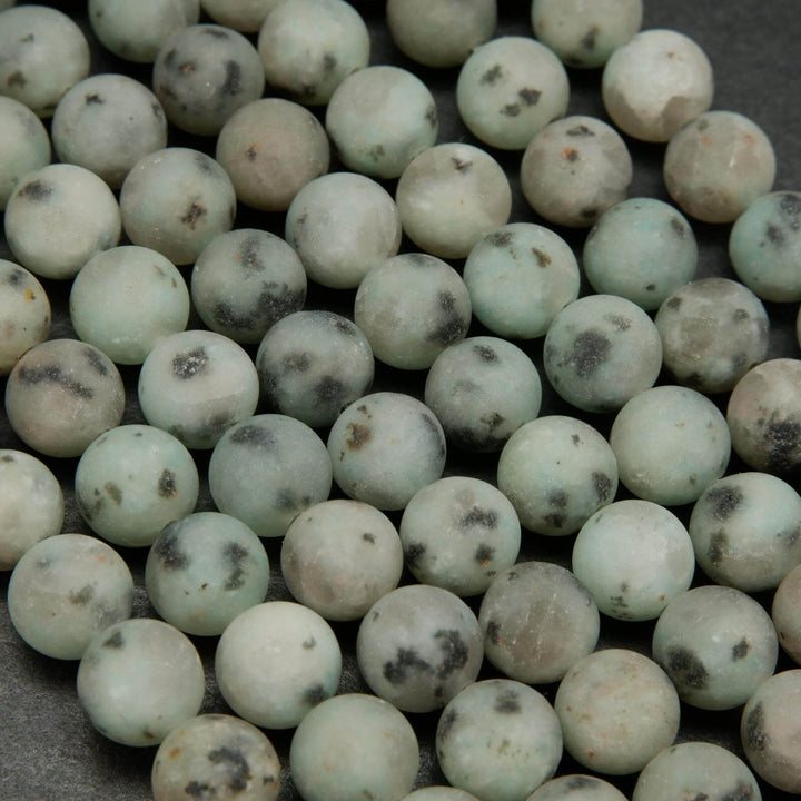Matte finish mint green kiwi jasper beads.