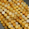 Matte finish yellow jade beads for jewelry making.