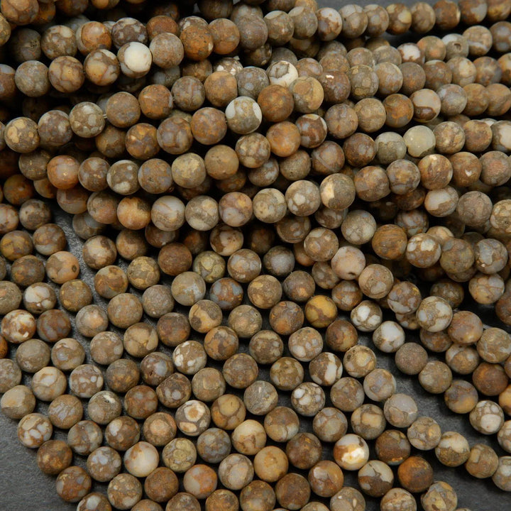Matte finish fire lace opal beads.