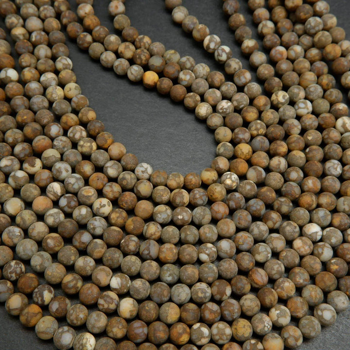 Matte finish fire lace opal beads.