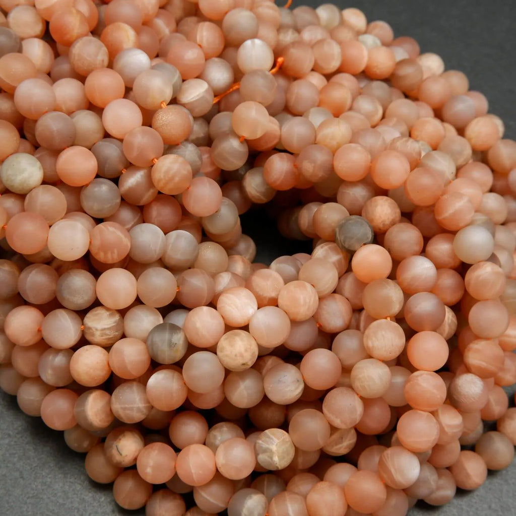 Matte finish round peach moonstone beads.