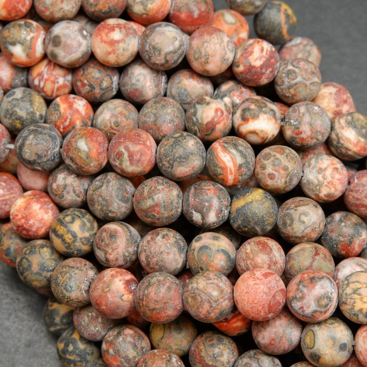 Red leopard skin jasper beads matte finish rounds.