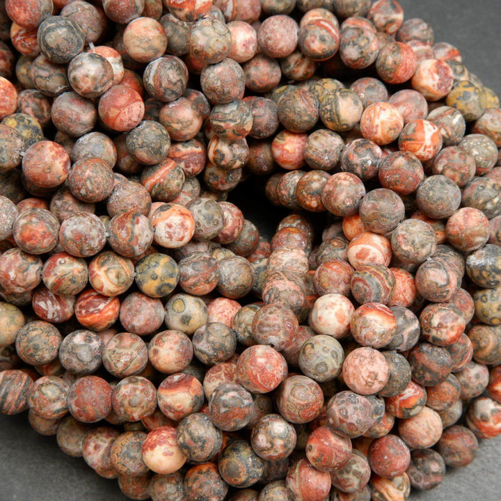 Red leopard skin jasper beads matte finish rounds.