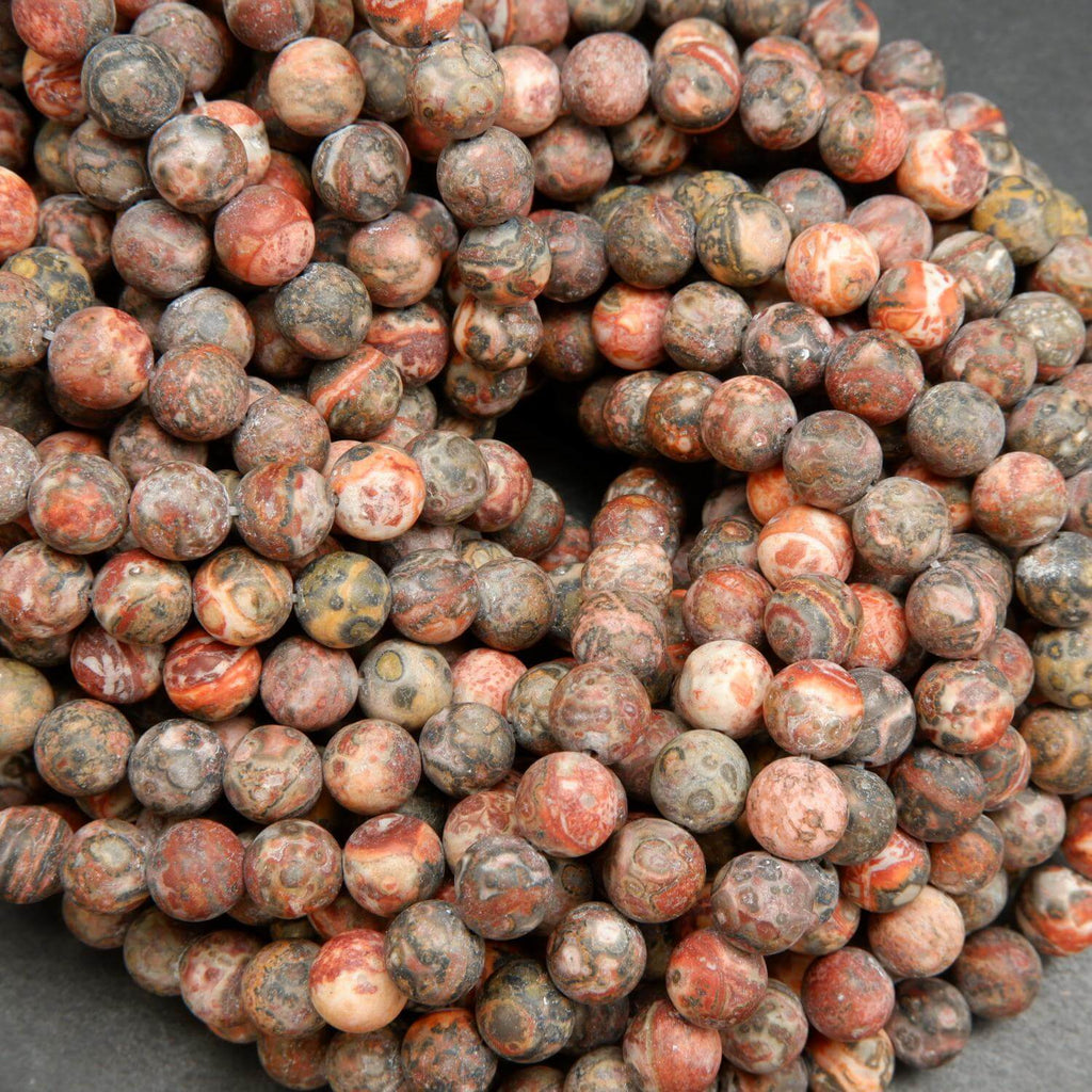 Red leopard skin jasper beads matte finish rounds.