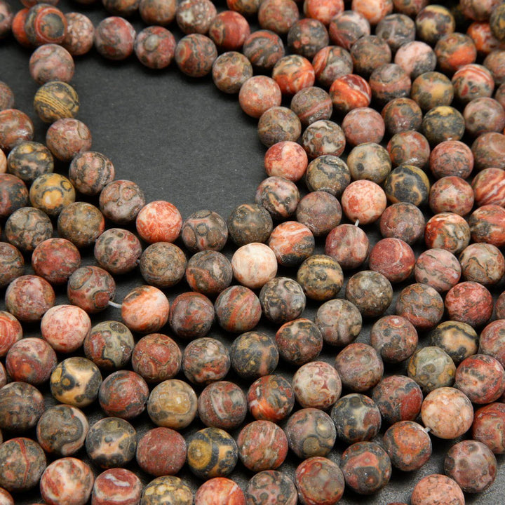 Red leopard skin jasper beads matte finish rounds.