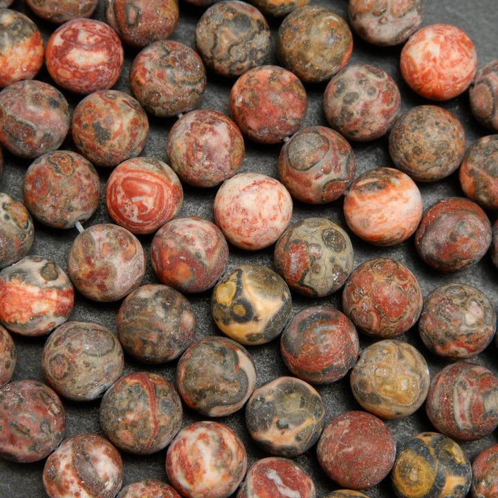 Red leopard skin jasper beads matte finish rounds.
