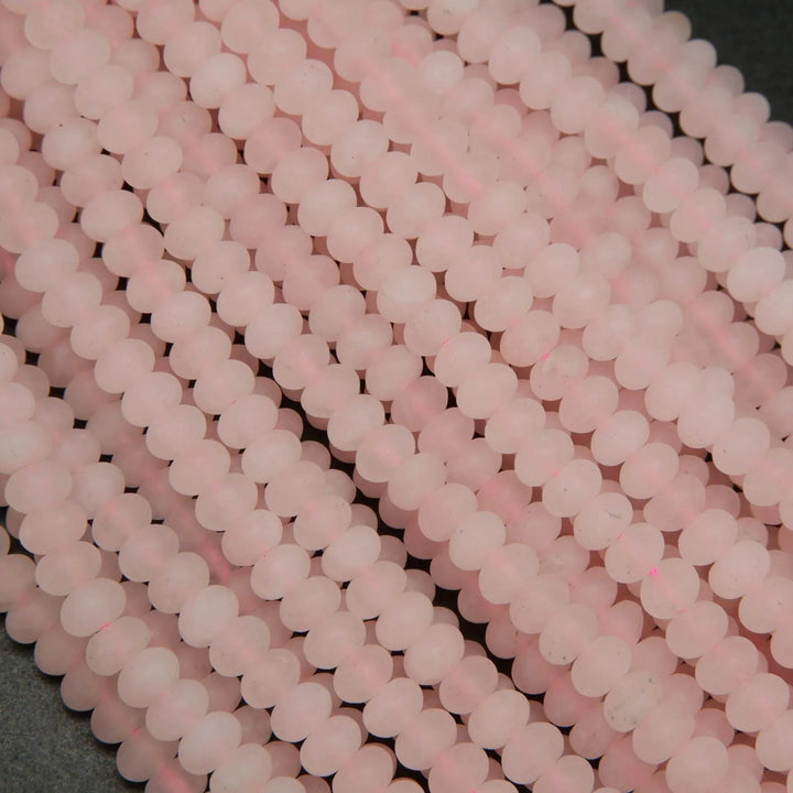 Pink matte finish rondelle rose quartz beads.