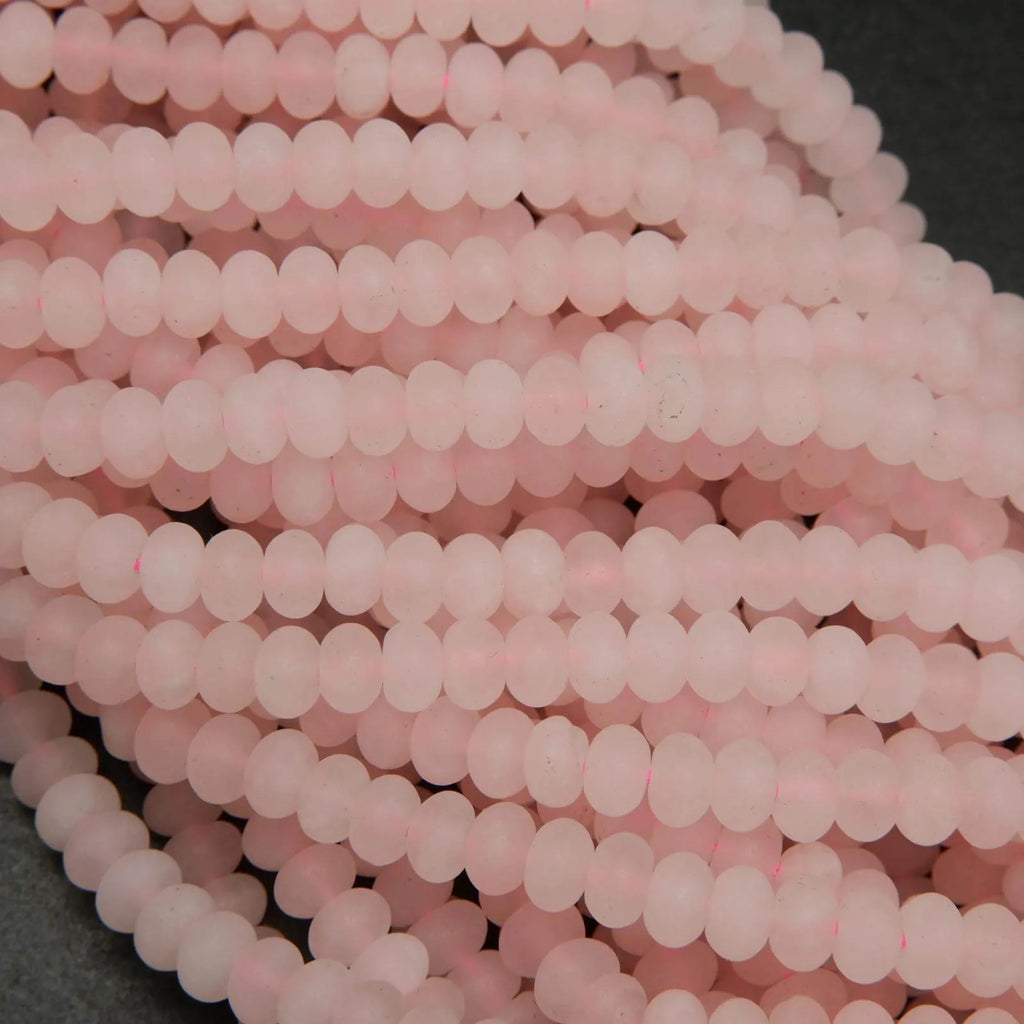 Pink matte finish rondelle rose quartz beads.