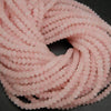Pink matte finish rondelle rose quartz beads.
