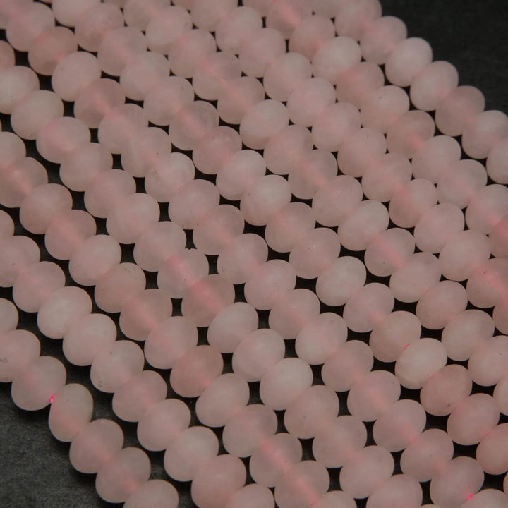 Pink matte finish rondelle rose quartz beads.