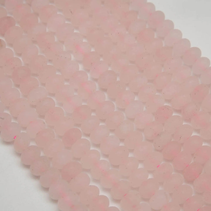 Pink matte finish rondelle rose quartz beads.