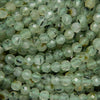 Prehnite with Epidote Inclusion Microfaceted Round Beads.