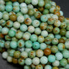 Green and white polished beads.