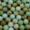 Green and white polished beads.