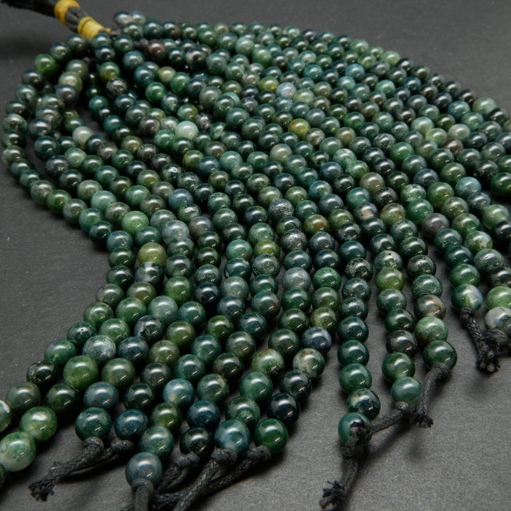 Large hole green moss agate beads.