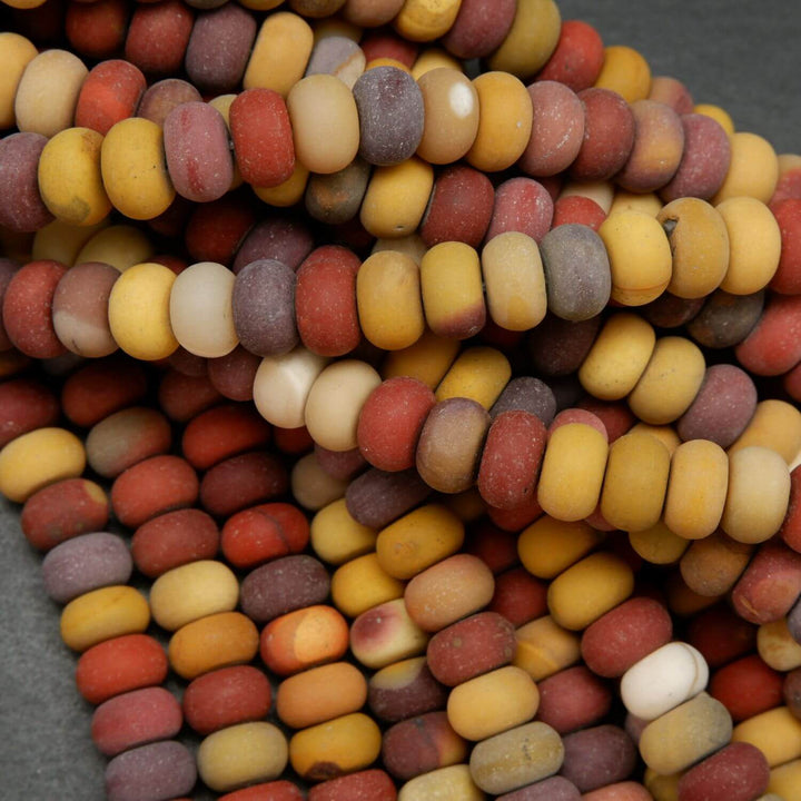 Red and yellow rondelle shape mookaite jasper loose beads with matte finish.