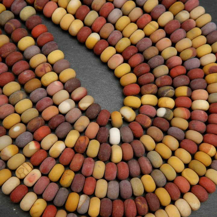 Red and yellow rondelle shape mookaite jasper loose beads with matte finish.