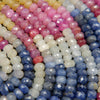 Multicolor faceted rondelle sapphire beads.