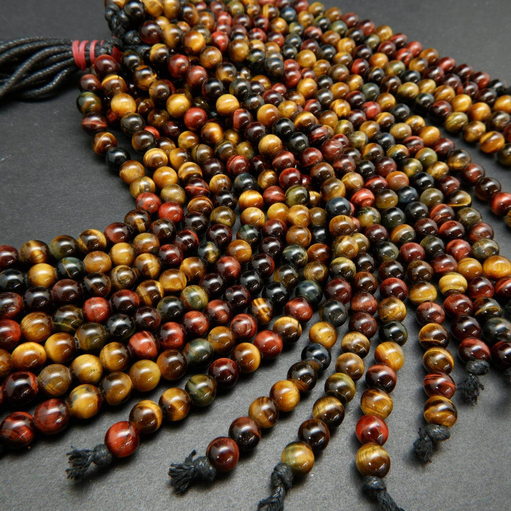 Multicolor large hole tiger eye beads.