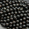 Black Arfvedsonite Beads with blue needles.