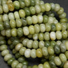 Green rondelle jade beads.