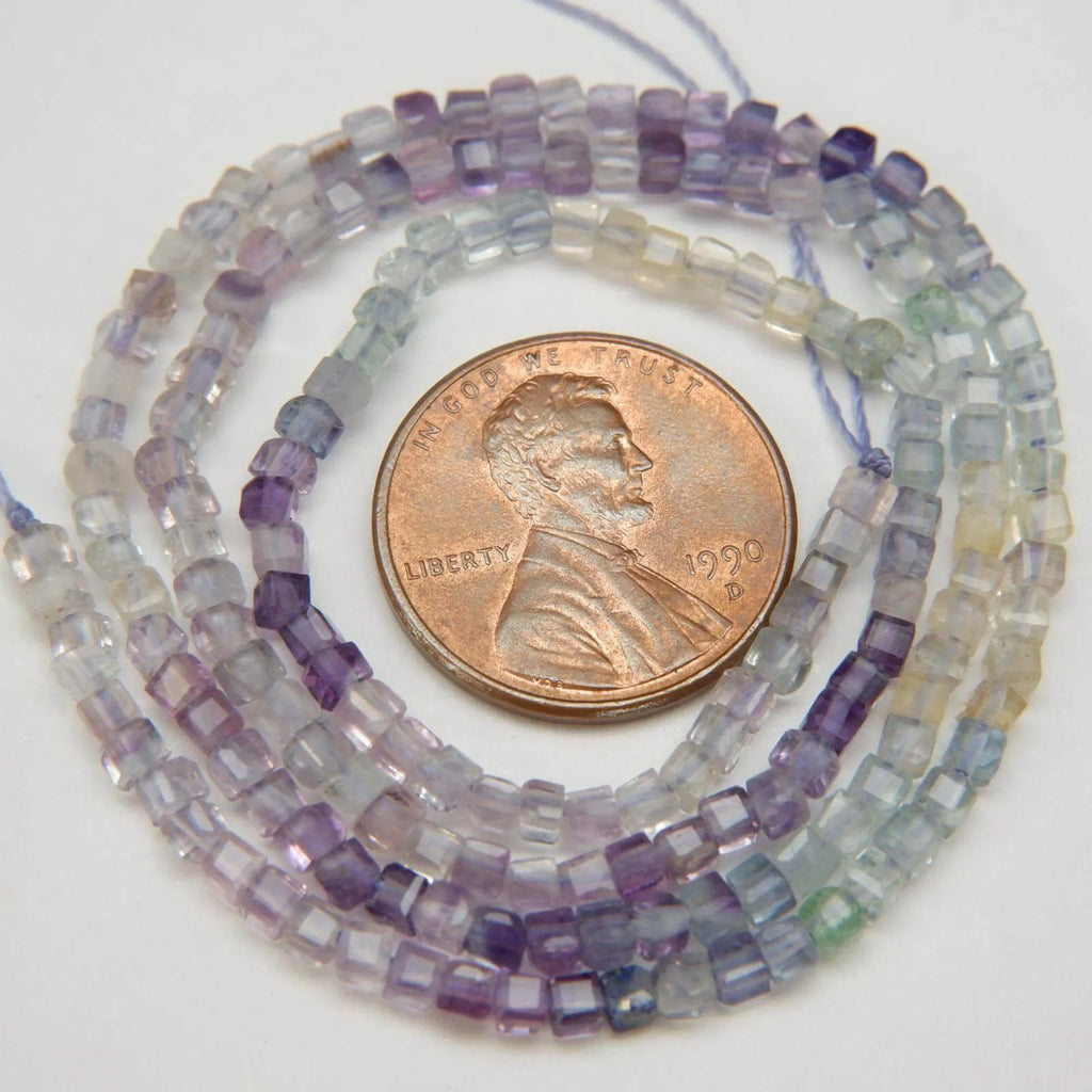 Ombre faceted fluorite cube beads.