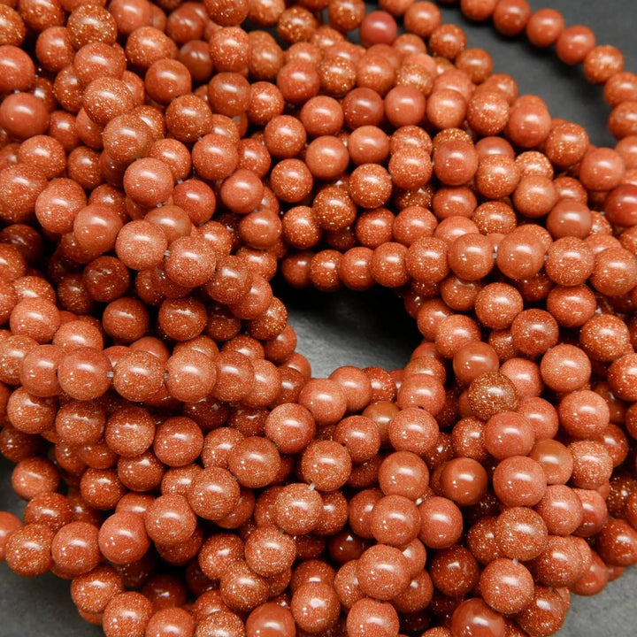 Orange goldstone beads.