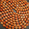 Prism shape orange red aventurine beads.