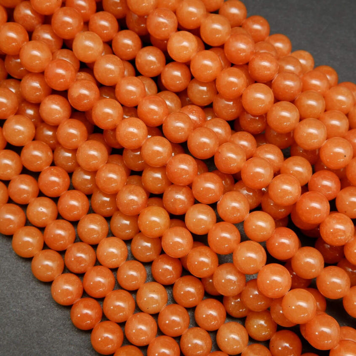 Polished Orange Red Aventurine Beads