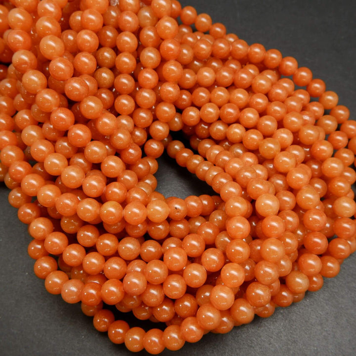 Polished Orange Red Aventurine Beads