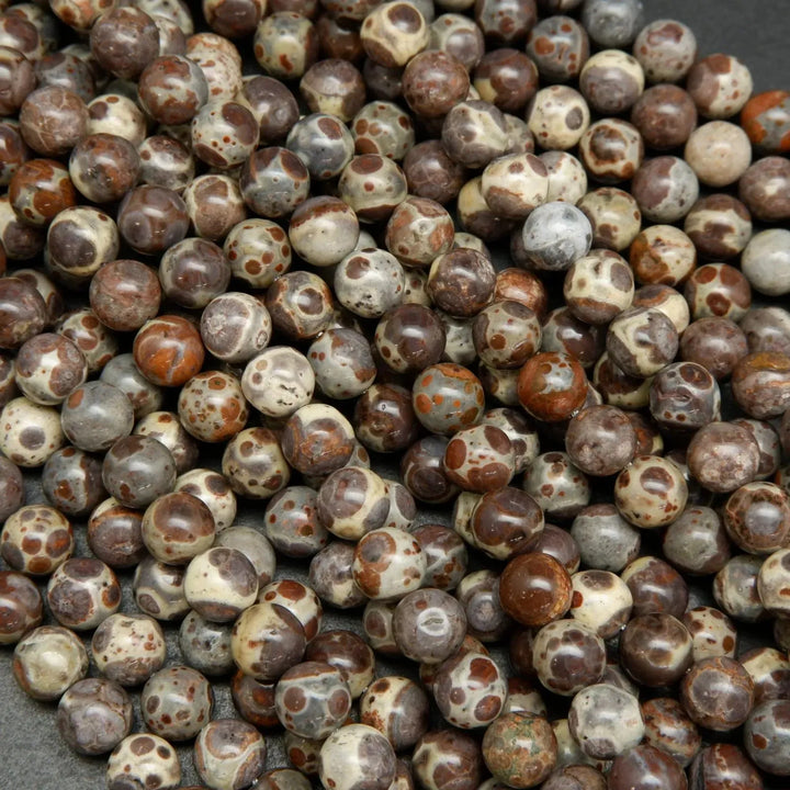 Purple grey and beige round orbicular jasper beads.