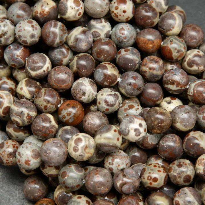 Purple grey and beige round orbicular jasper beads.
