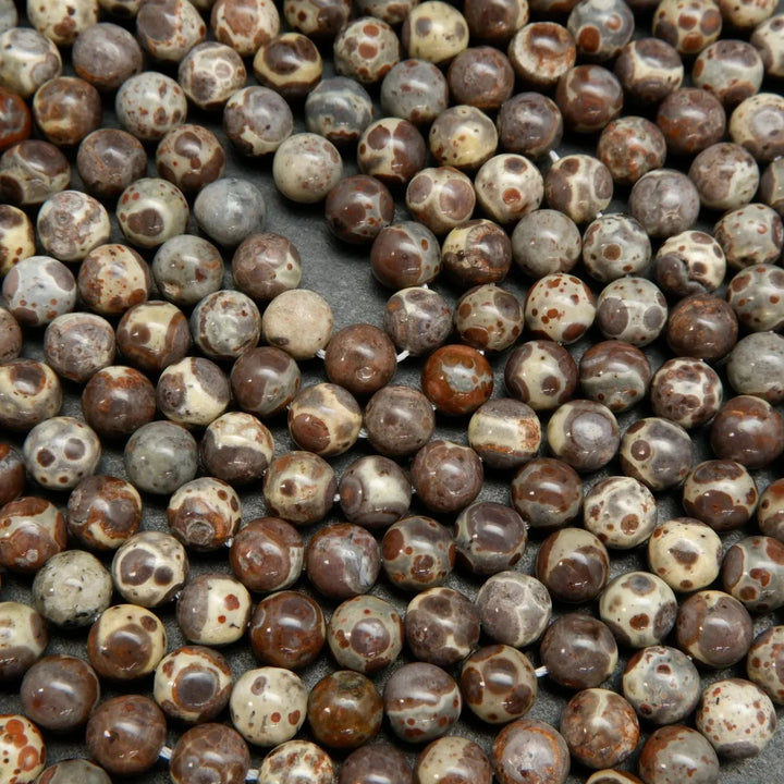 Purple grey and beige round orbicular jasper beads.