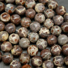 Purple grey and beige round orbicular jasper beads.