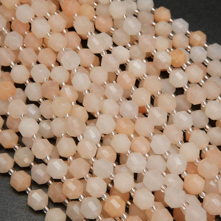 Peach aventurine faceted prism beads.